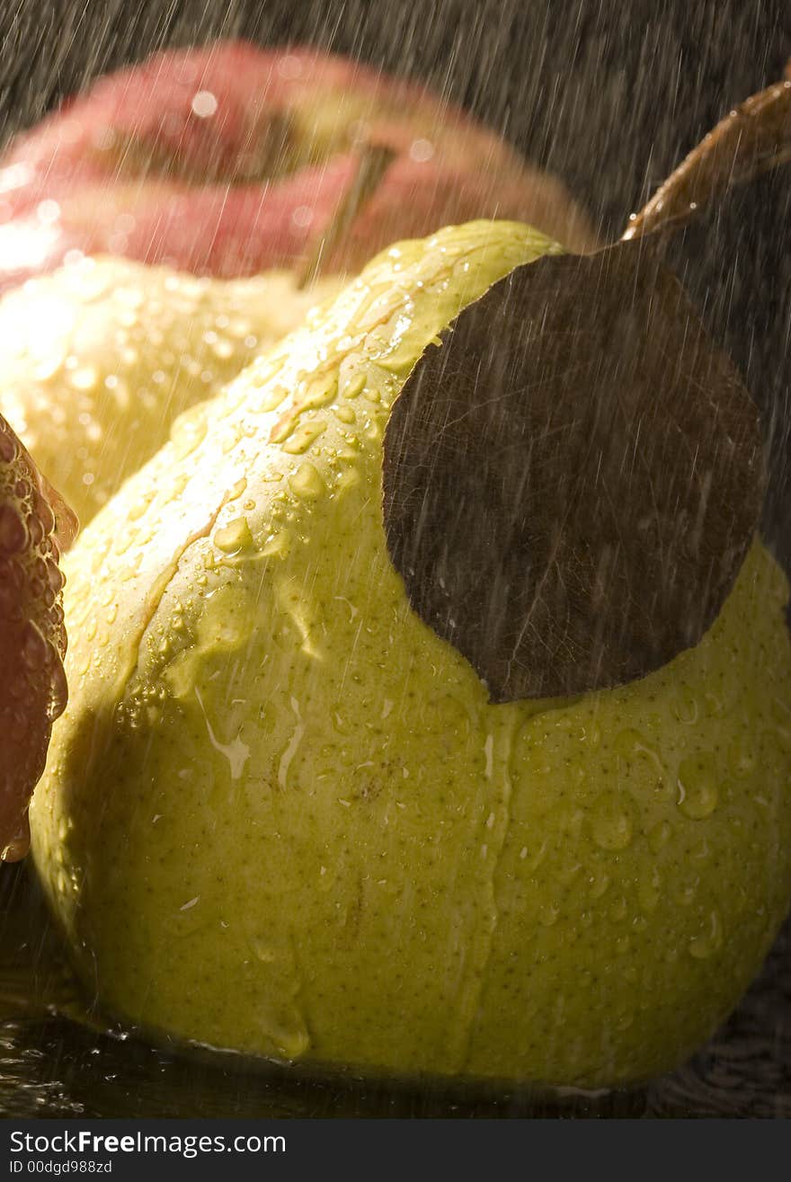 Pear is a fruit that has a yellow or green skin and is white inside. Pears are thinner at the top (i.e. where they join onto the tree) than at the bottom.