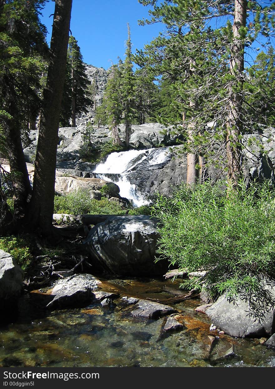 A small cascade along the shadow trail in the ansel adams wilderness. A small cascade along the shadow trail in the ansel adams wilderness