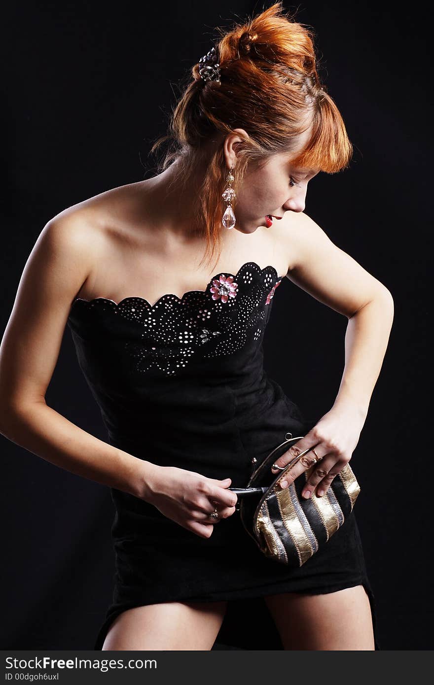 YOUNG STYLISH  WOMAN IN WHITE BACKGROUND. SHOT IN STUDIO. YOUNG STYLISH  WOMAN IN WHITE BACKGROUND. SHOT IN STUDIO.