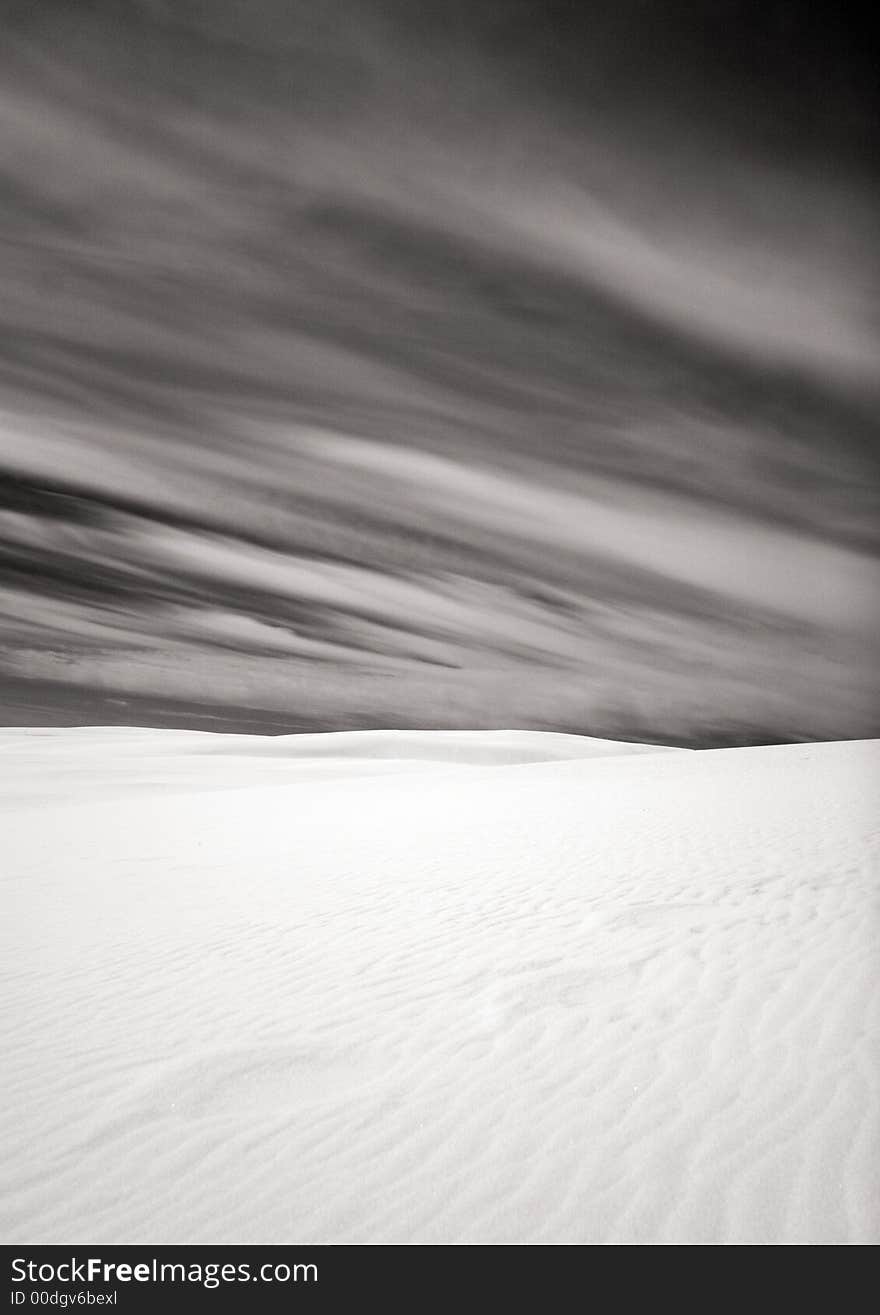 Moving dunes are a kind of sand dunes.They characterize that smaller grains, appearing in a small quantity in the sea sand are usually blown off from the top. The constant movement of grains ( which are not kept by the plants), induces the progressive movement of dunes tops according to direction of dominant winds.