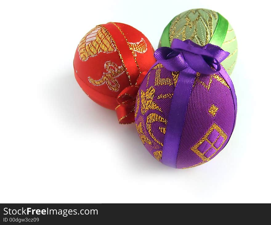 Easter painted egg tied up by tapes