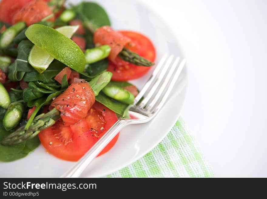 Asparagus, smoked salmon & rocket salad - shallow depth of field. Asparagus, smoked salmon & rocket salad - shallow depth of field