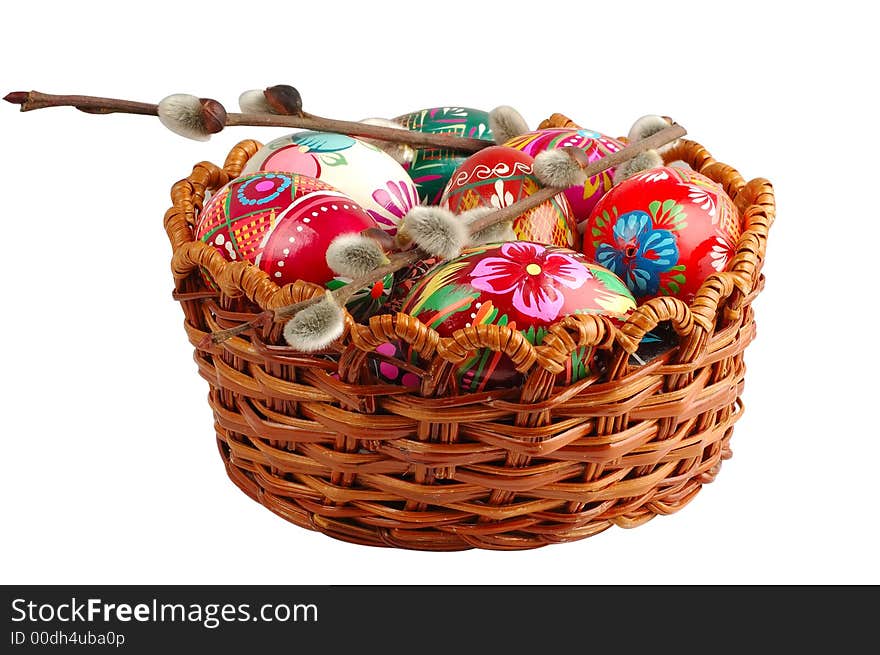 Basket with easter eggs isolated on white background. Basket with easter eggs isolated on white background