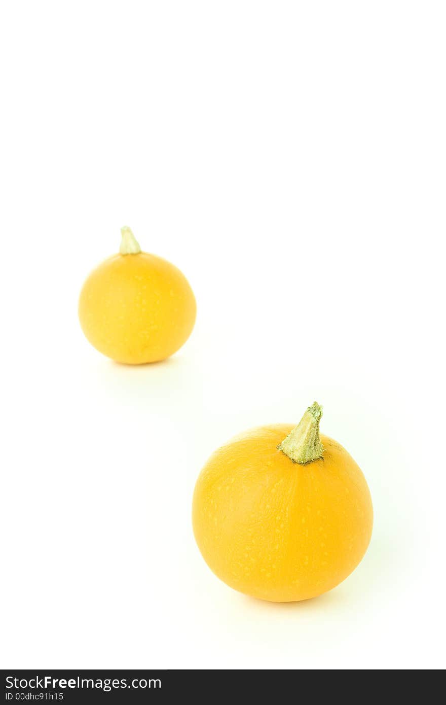 Two orange pumpkins on the white background. Two orange pumpkins on the white background