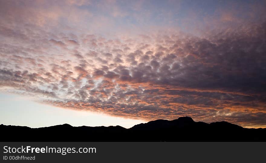 Burning clouds on the sky of my town and mausoleum of our poet Njegos.