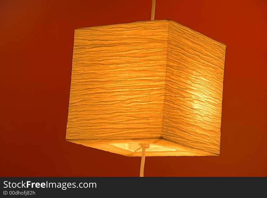 A Decorative light isolated on a red background. A Decorative light isolated on a red background