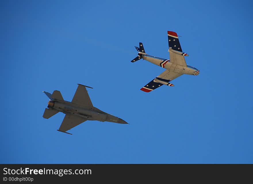 Two jetfighters performing at airshow. Two jetfighters performing at airshow