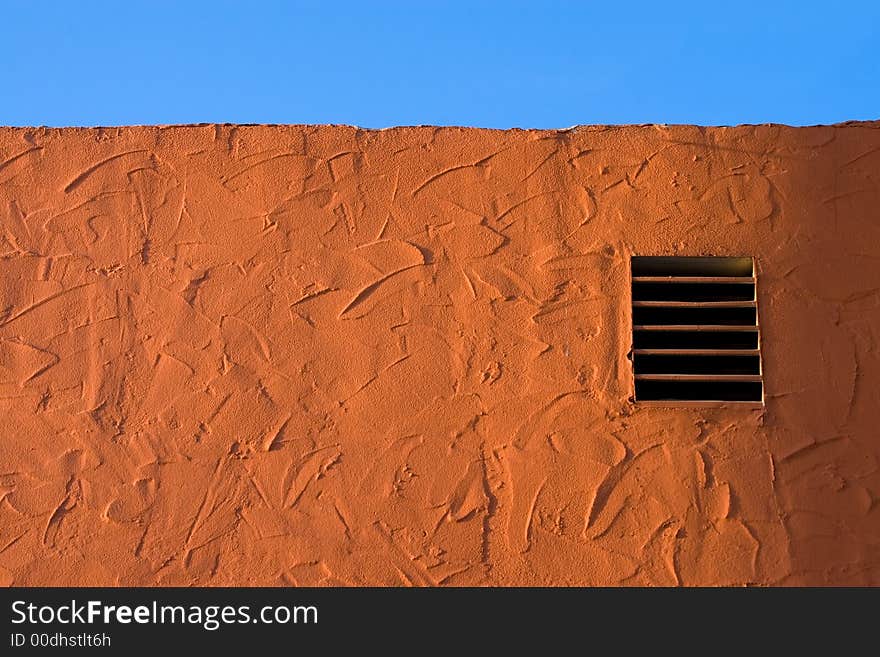 Stucco Wall Orange Texture Background.