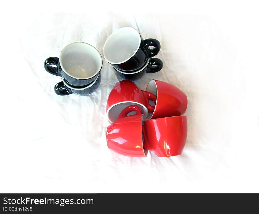 Eight Black and red cups isolated over white. Eight Black and red cups isolated over white