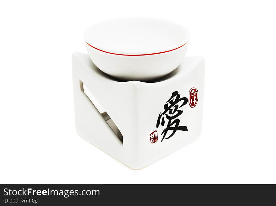 Japanese ceramic lamp for aromatherapy on a white background. Japanese ceramic lamp for aromatherapy on a white background