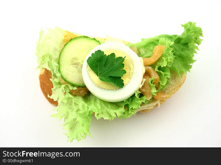 Top view at fresh sandwich with ingredients put on iceberg lettuce