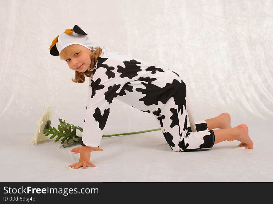 The girl in a fancy dress of the cow