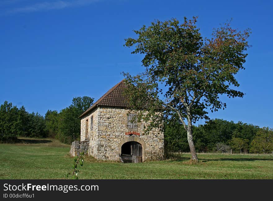 House in the middle of a field