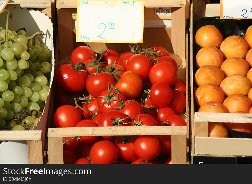 Tomatoes for sale on display