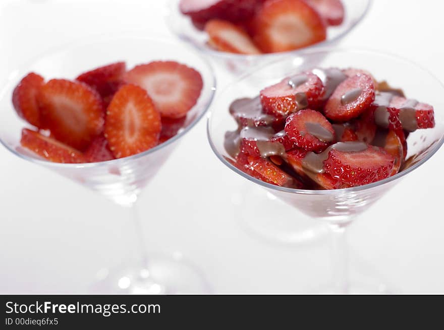 Red beautiful strawberry on the glass