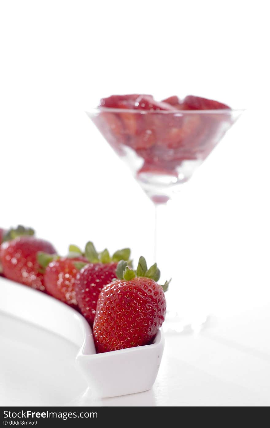 Red beautiful strawberry on the glass