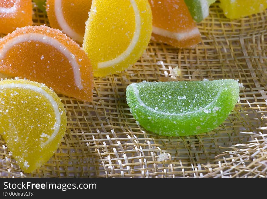 A photo of orange, green and yellow marmalade. A photo of orange, green and yellow marmalade