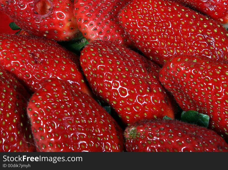 Close-up image of a bunch of strawberries showing details