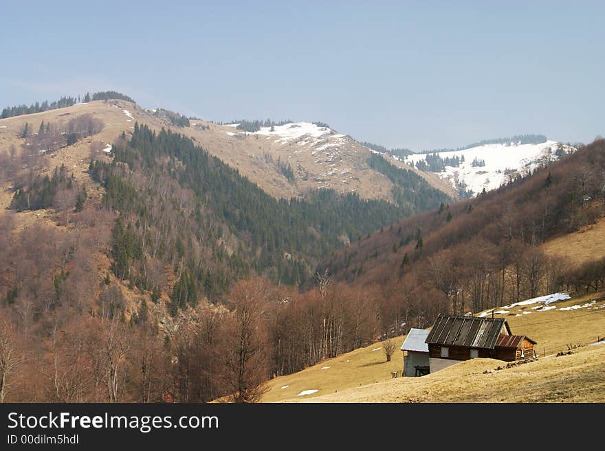 Mountain landscape with isolated houses on romanian mountains