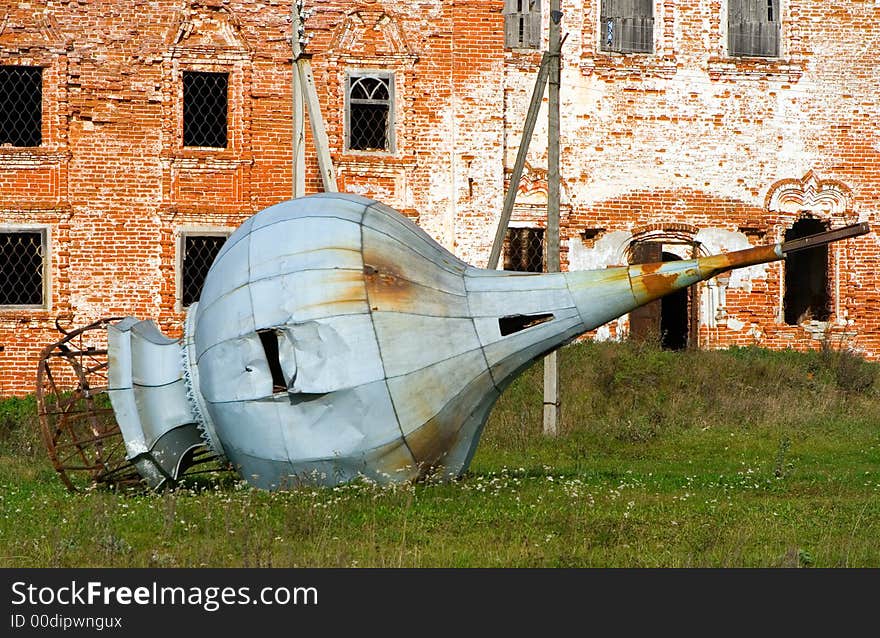 Old rusty cupola, fallen to the ground