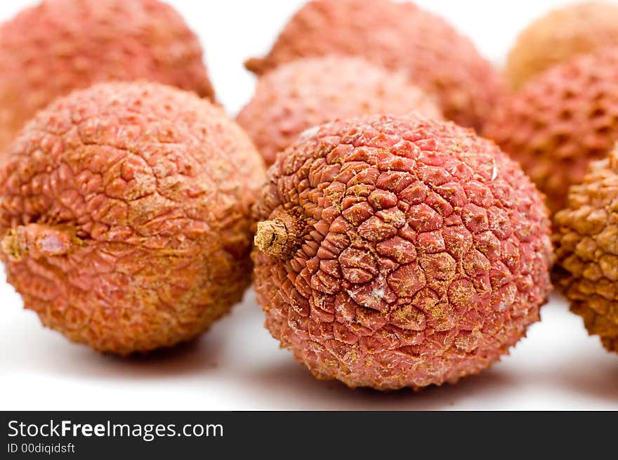 Closeup of litchies isolated on white