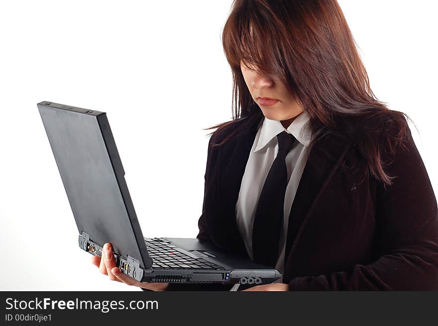 Business woman holding laptop