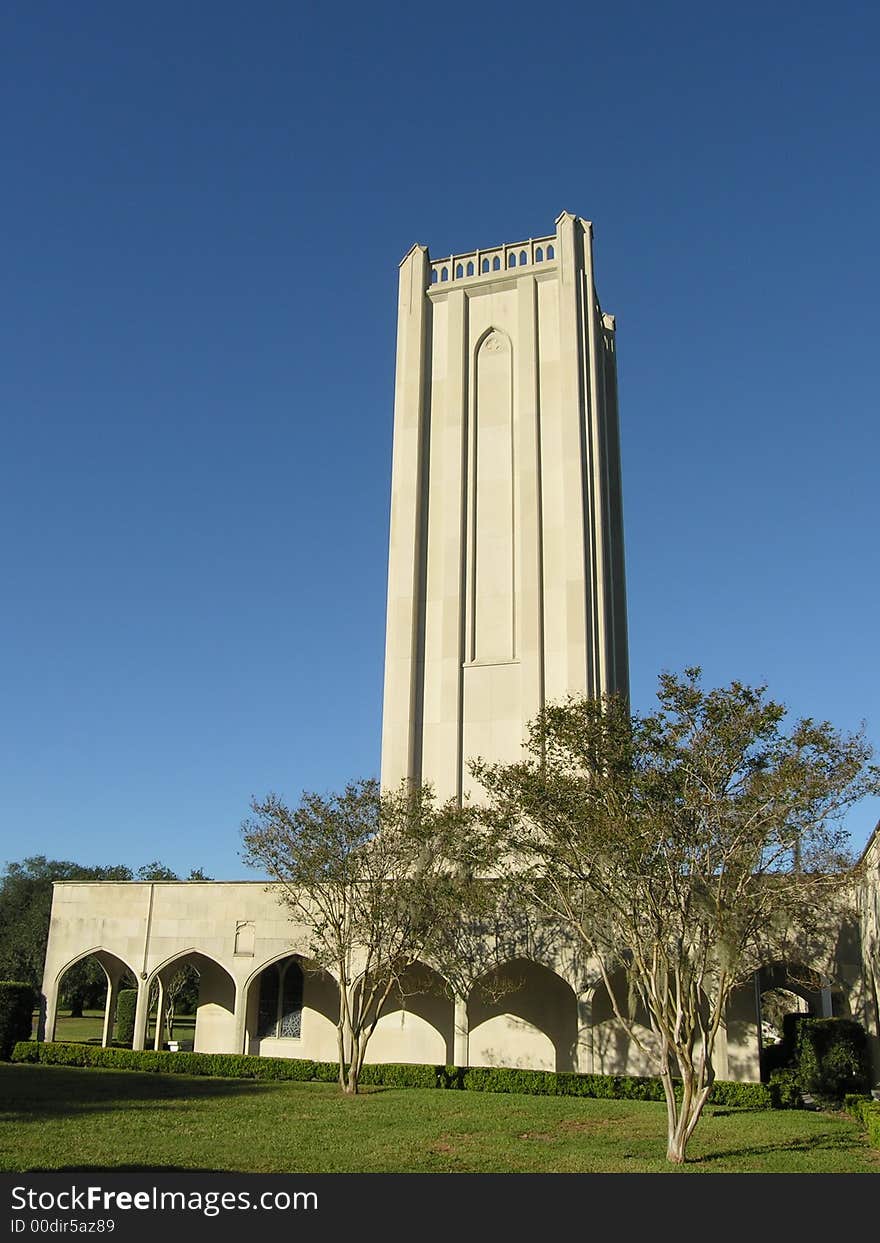 Memorial gardens tower with blue sky and trees