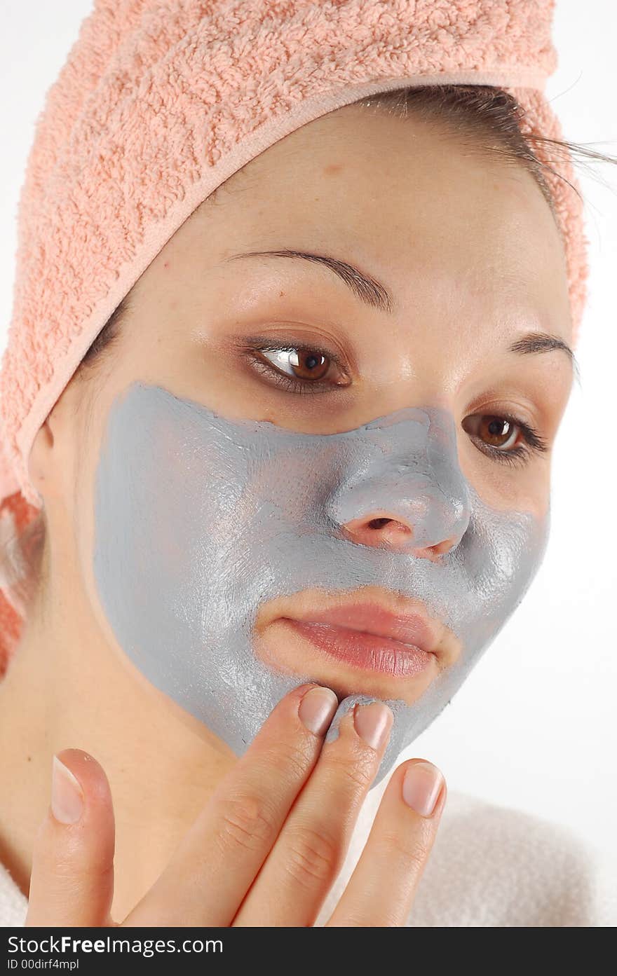 Attractive woman with facial mask. Attractive woman with facial mask