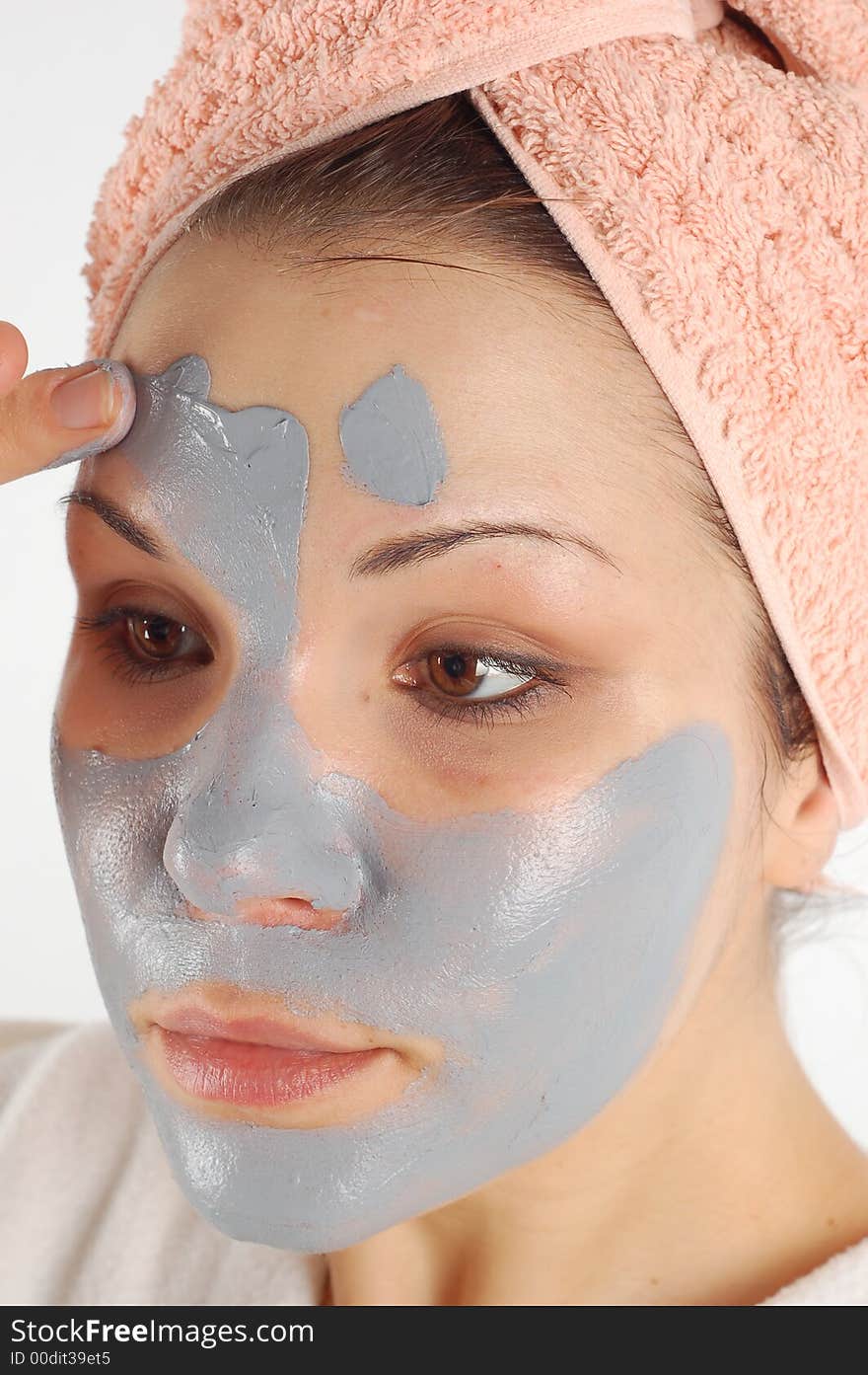 Attractive woman with facial mask. Attractive woman with facial mask