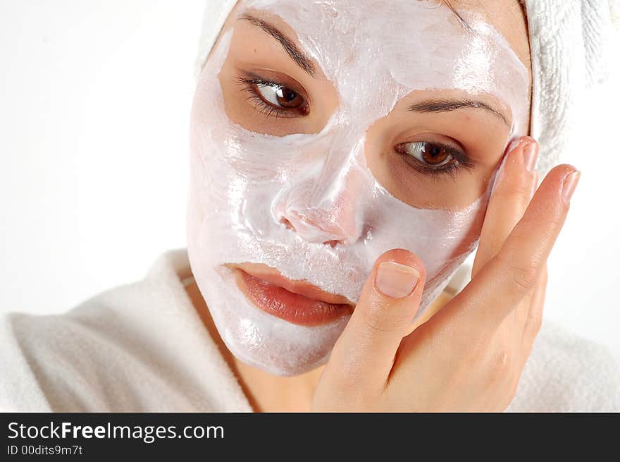 Attractive woman with facial mask. Attractive woman with facial mask