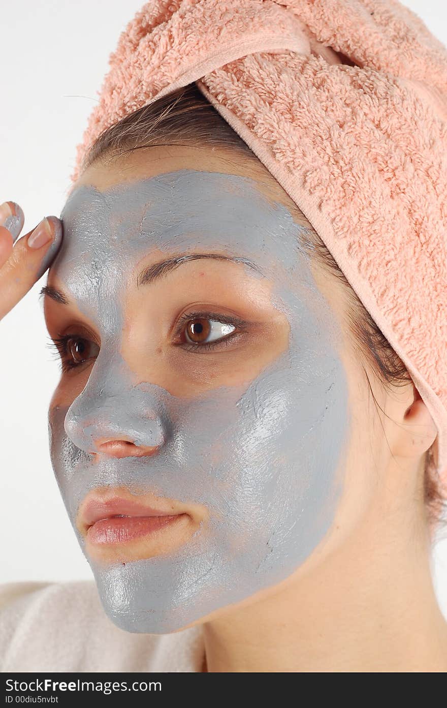 Attractive woman with facial mask. Attractive woman with facial mask