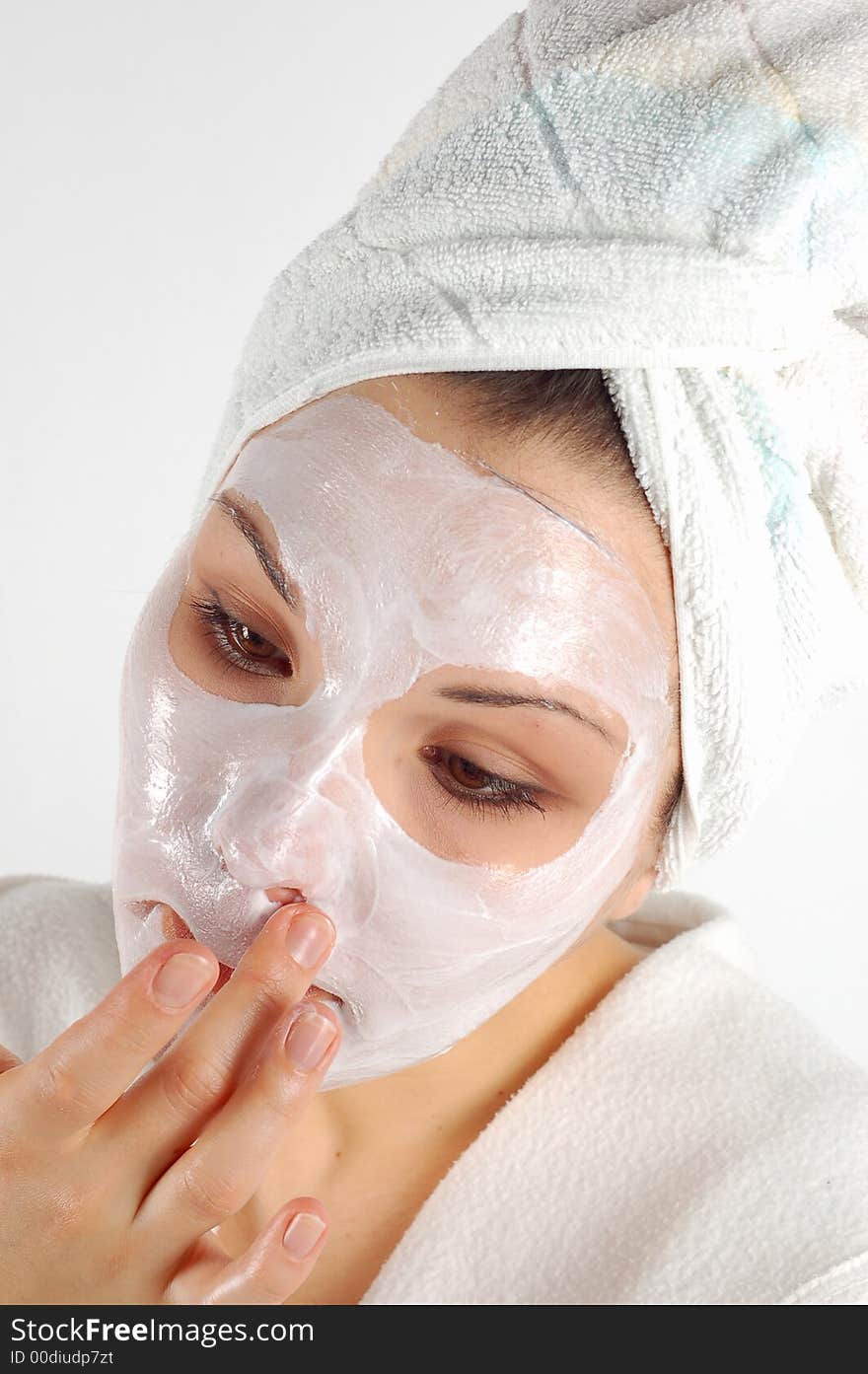 Attractive woman with facial mask. Attractive woman with facial mask