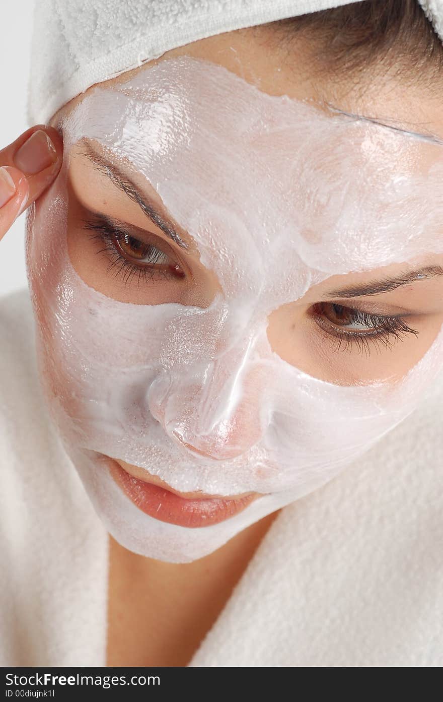 Attractive woman with facial mask. Attractive woman with facial mask