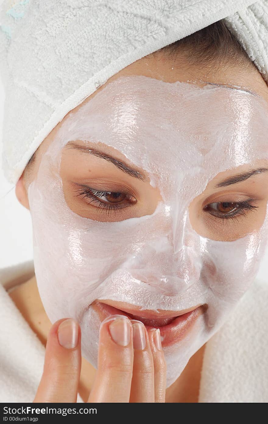 Attractive woman with facial mask. Attractive woman with facial mask