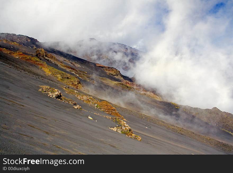 The Etna landscape, volcanic rocks and grass