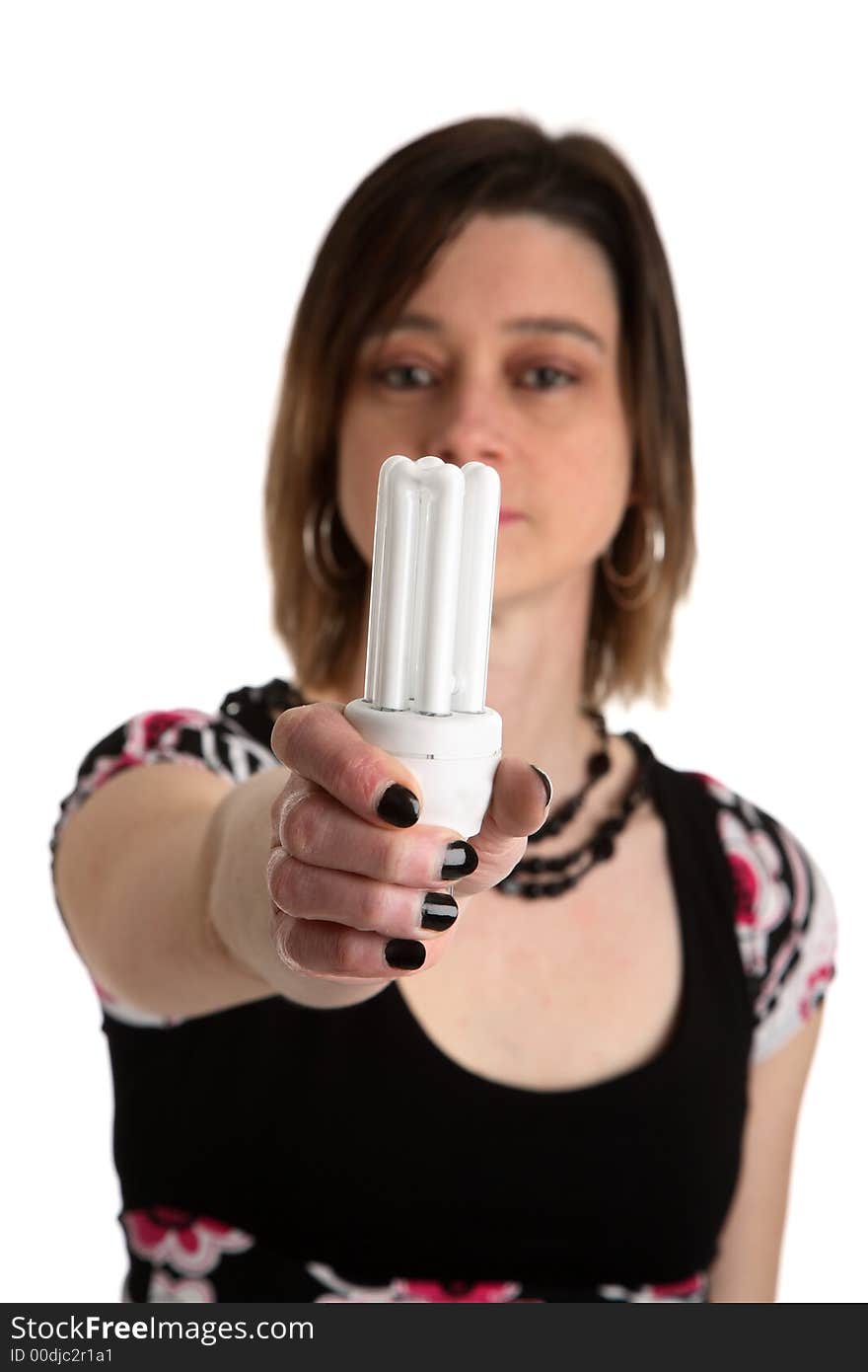 Woman holding an energy saving fluorescent lamp. Woman holding an energy saving fluorescent lamp