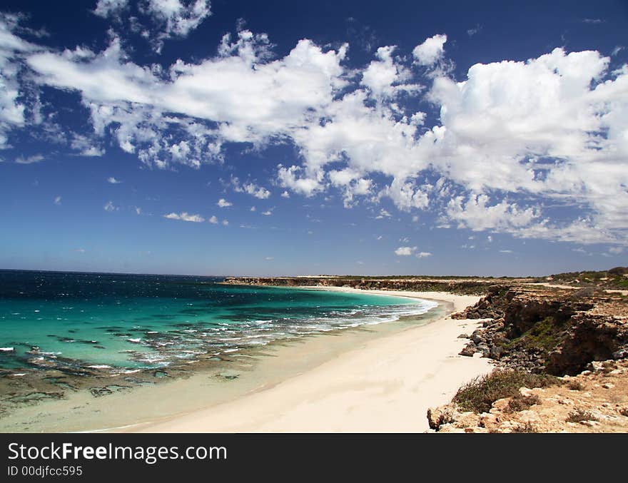 Seascape, with dramatic blue sky and white clouds, horizontal. York Peninsula, South Australia.