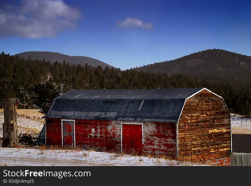 Old Red American Barn In Snow