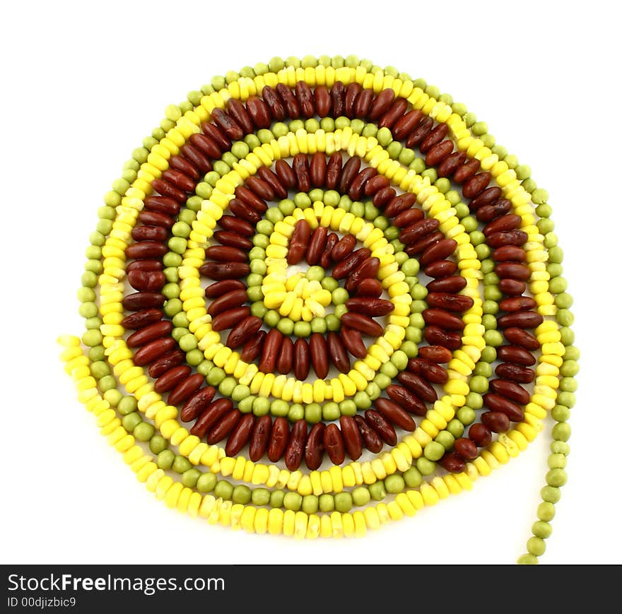 Colorful vegetable spiral on the white background. Colorful vegetable spiral on the white background