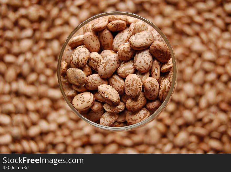 Beans in glass in focus