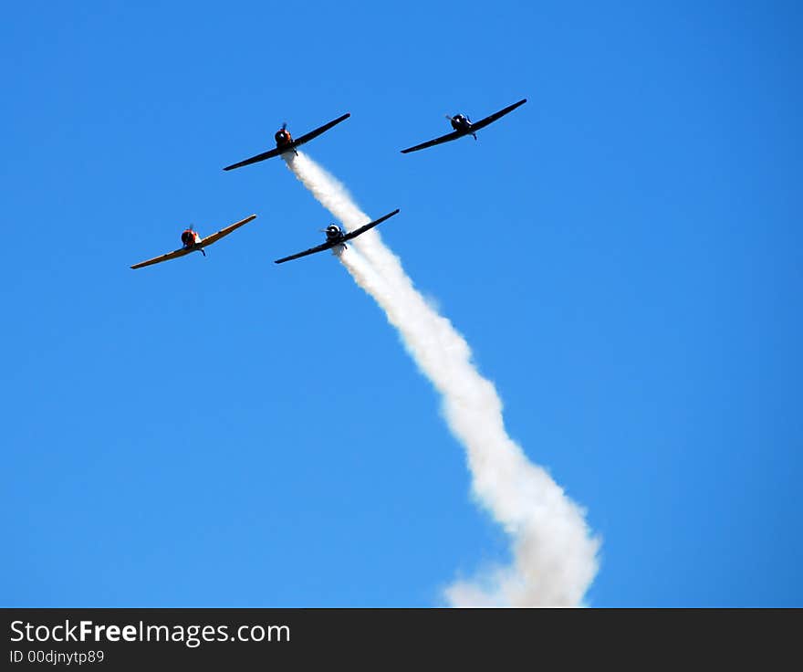 Four jets flying in formation at airshow. Four jets flying in formation at airshow