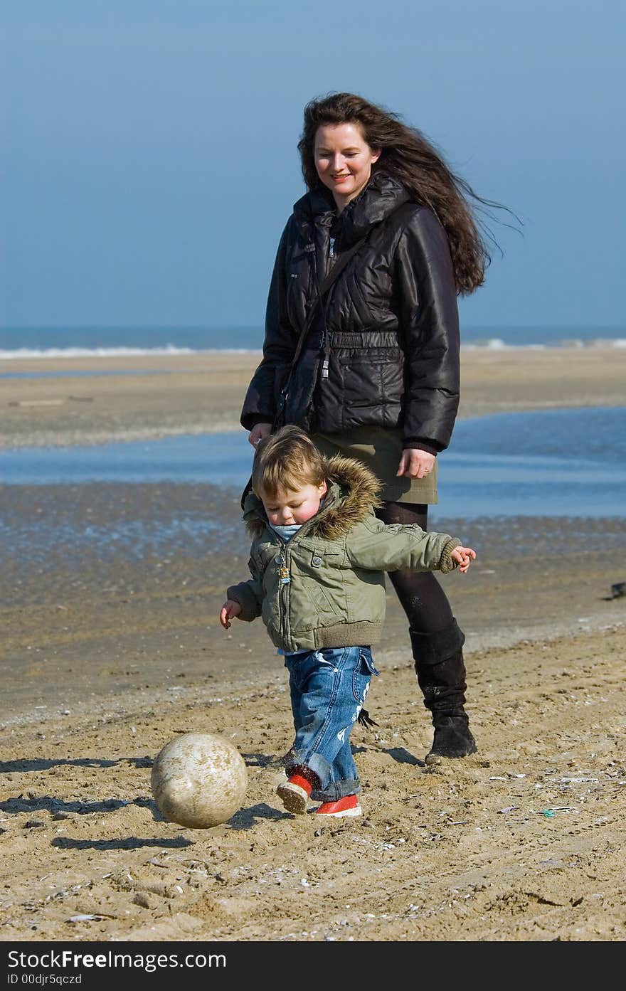 Mother and child on the beach