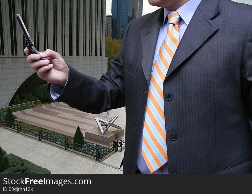 Businessman talking on the street