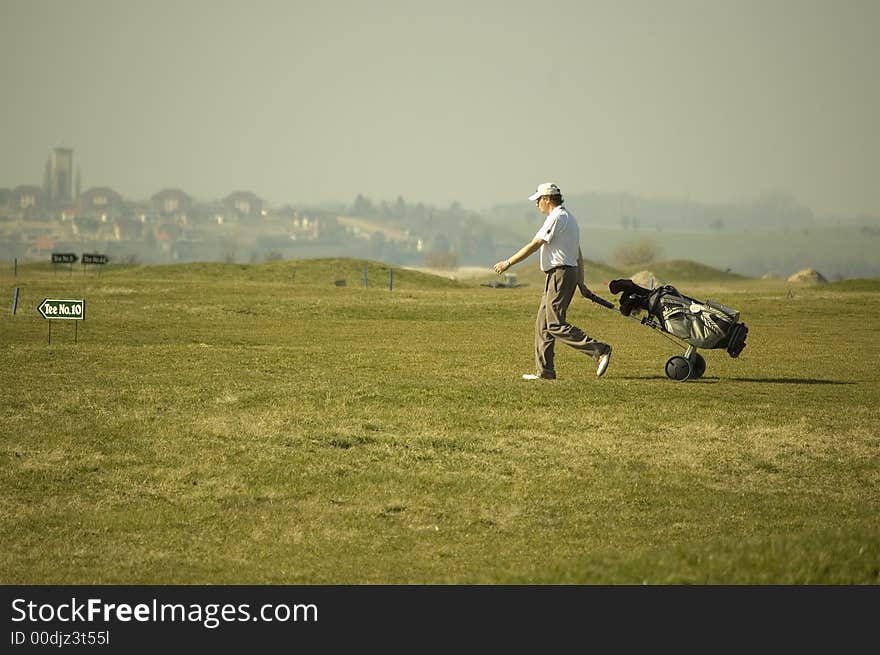 Man who play golf in Milovice in Czech Republic