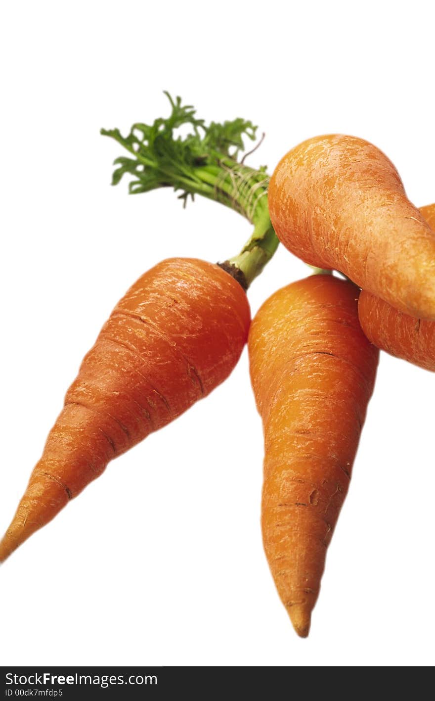 Cleared orange carrots on a white background