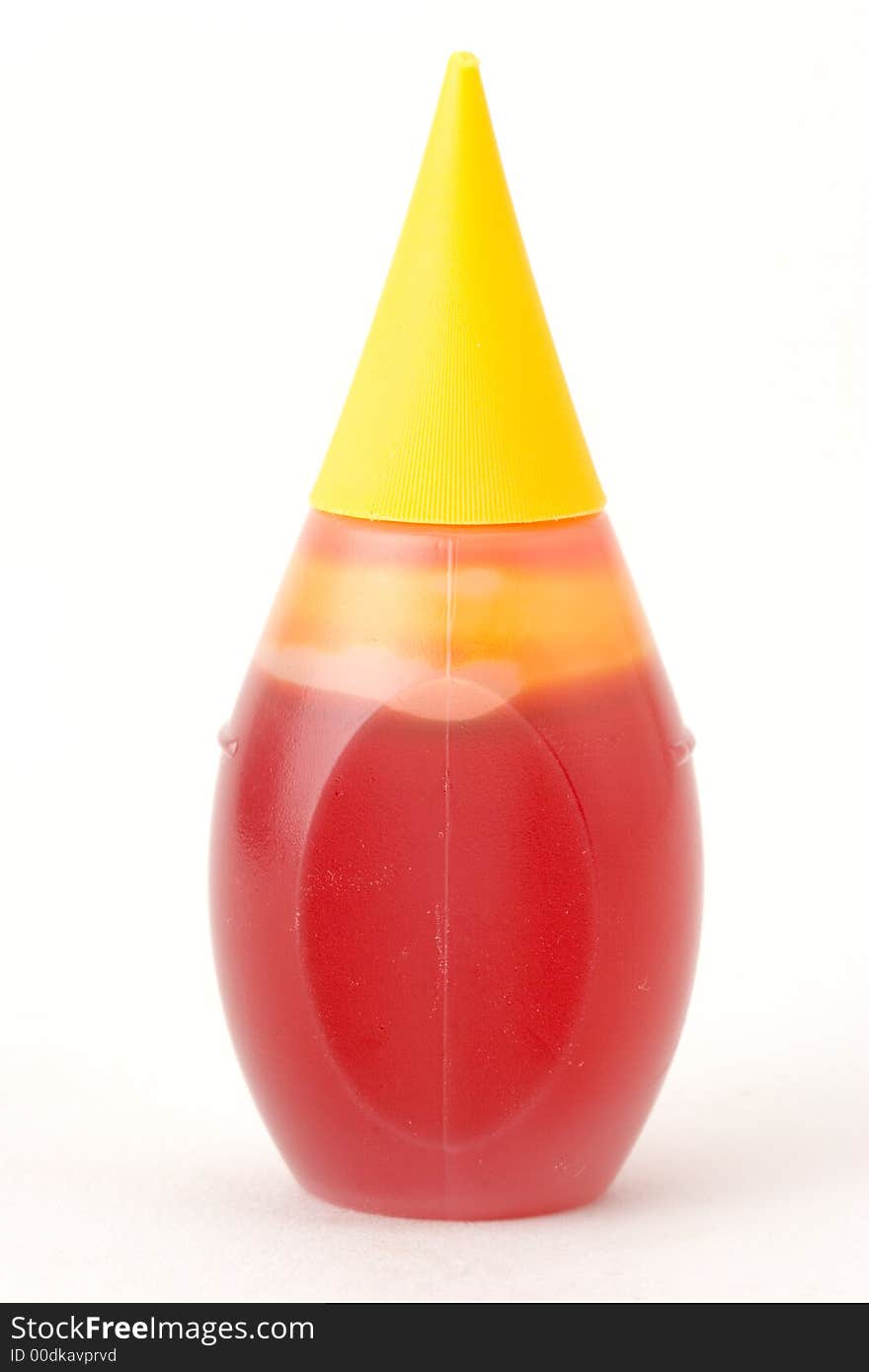 Bottle of yellow food coloring