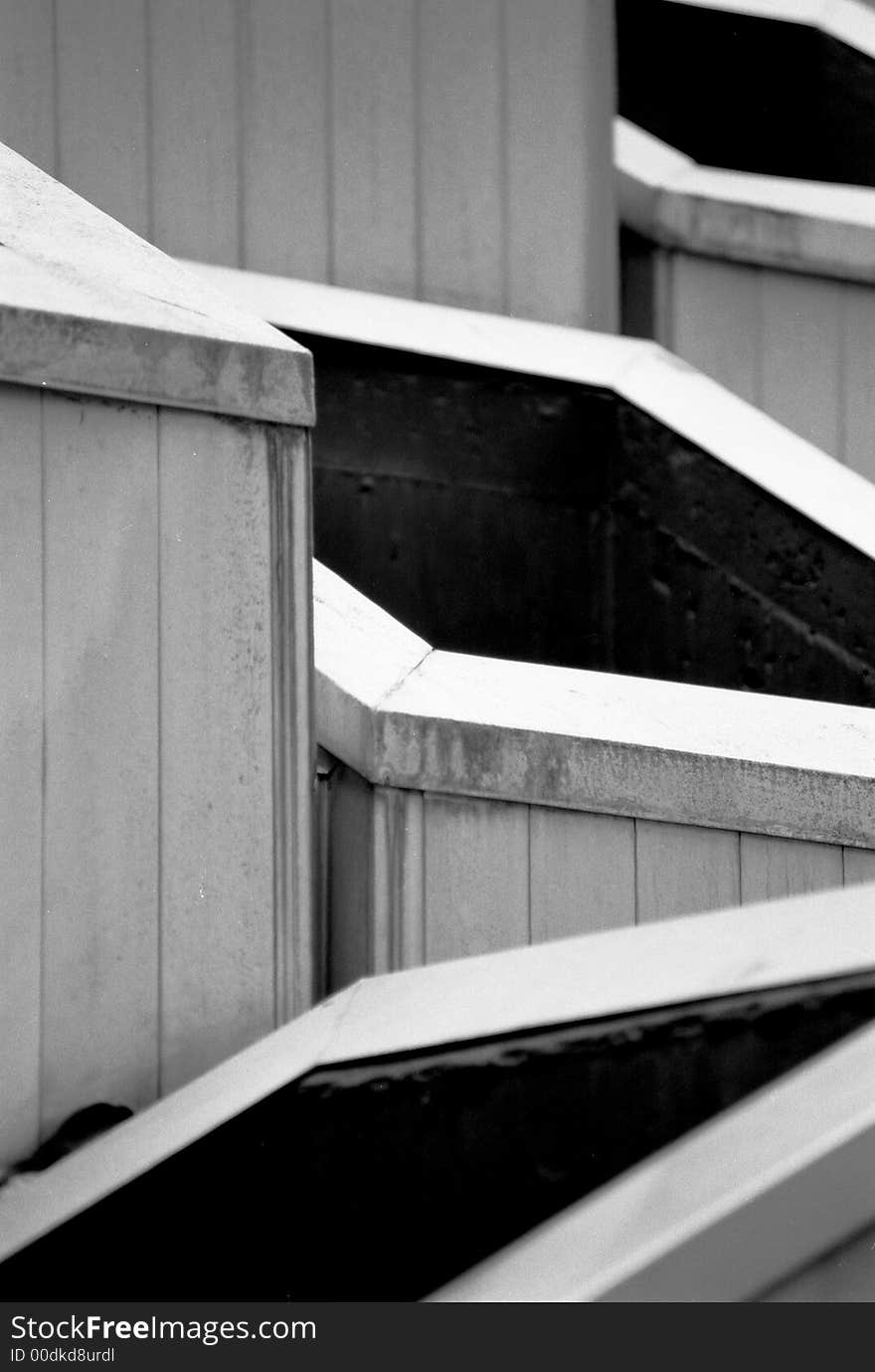 Black and white detail shot of air ducts or vents - look like chimneys