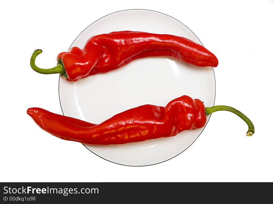 Two red hot chili peppers. Two red hot chili peppers