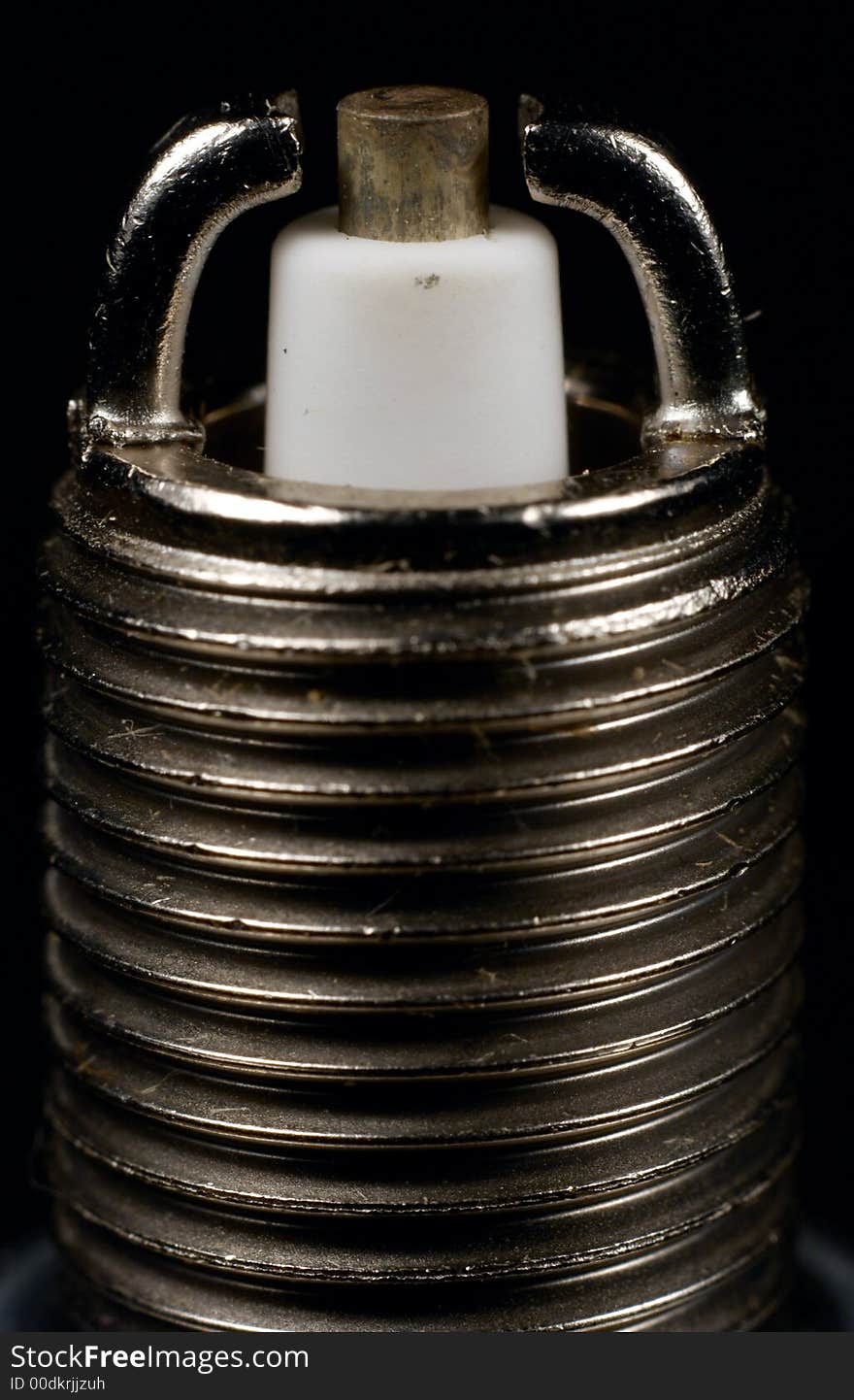 Spark plug on black background. Spark plug on black background