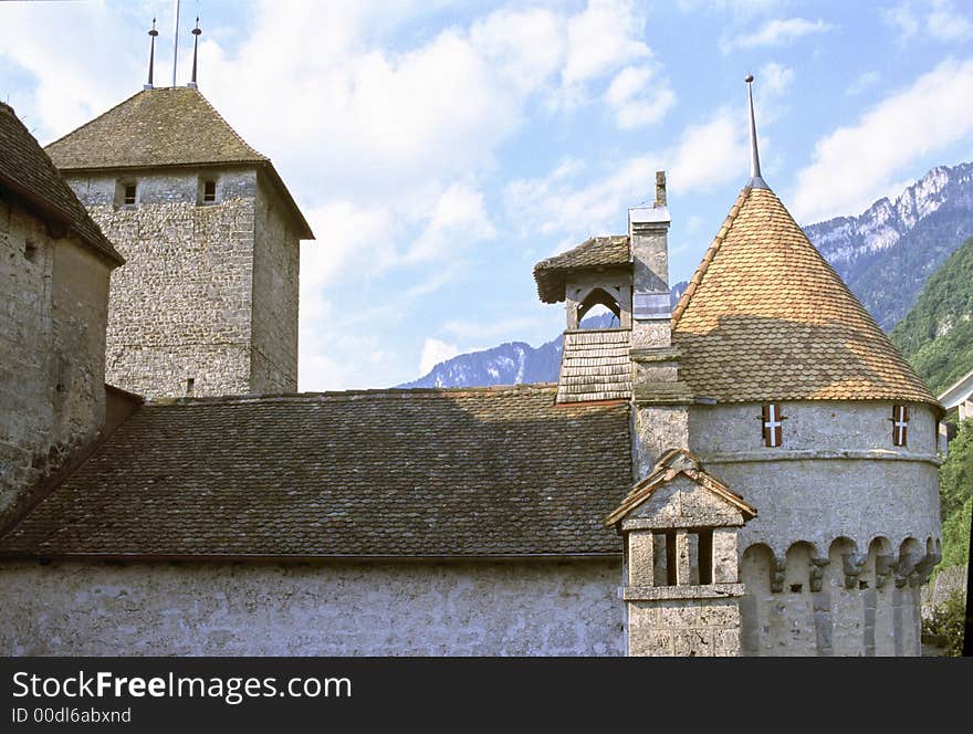 Towers and roofs of medieval castle of Chillon, on Geneva Lake in Switzerland. Towers and roofs of medieval castle of Chillon, on Geneva Lake in Switzerland.